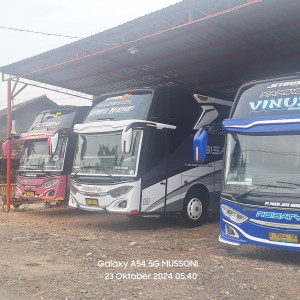 sewa bus wisata legrest  executive suspensi