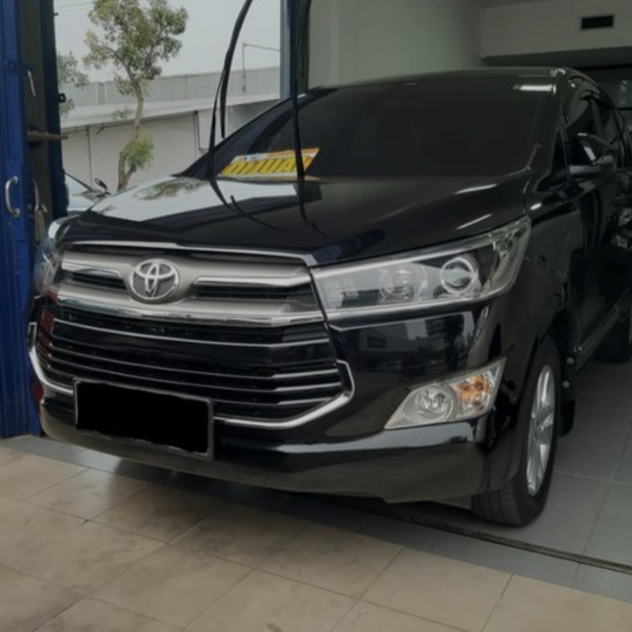 Sewa Mobil Innova All in dalam kota - samping