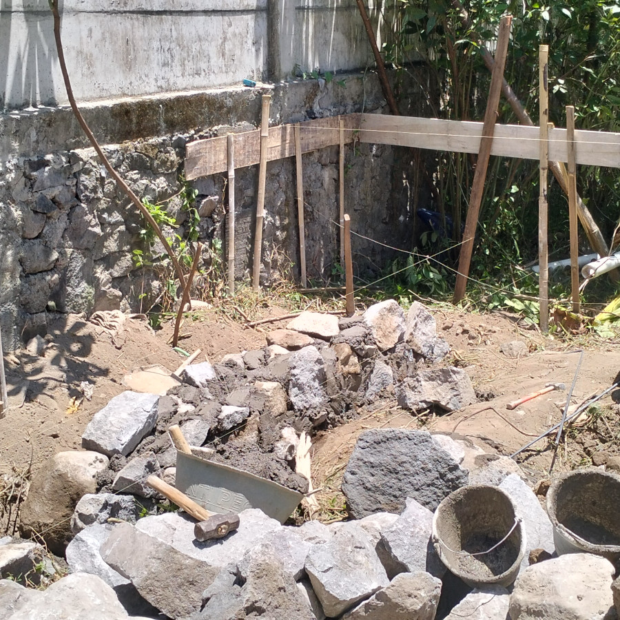 Pemasangan Batu kali camp. 1PC:6PP per m3