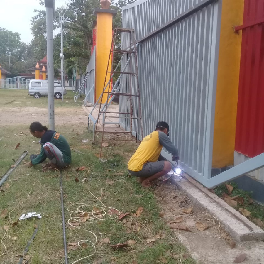 Jasa perbaikan pintu besi /drek  dan pengelasan