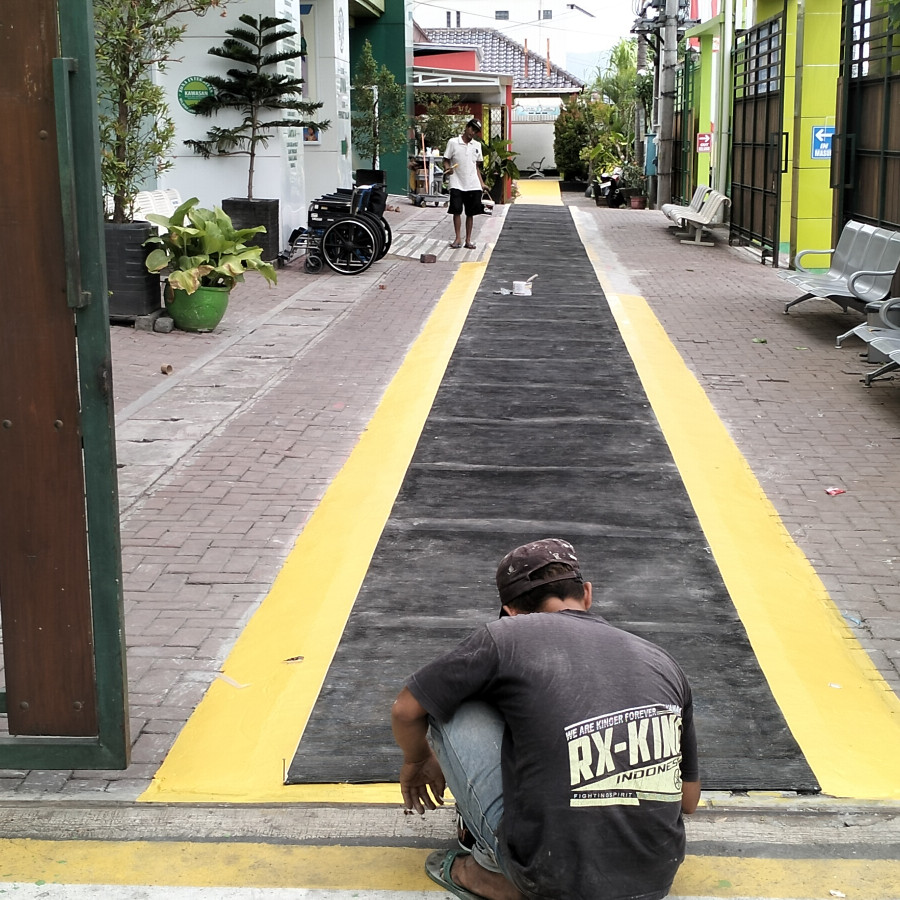Pek. Pengecatan jalan per m2