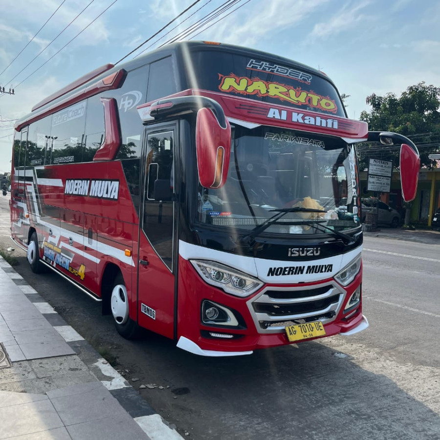 SEWA KENDARAAN MICROBUS ISUZU MERAH AG 7010 UE