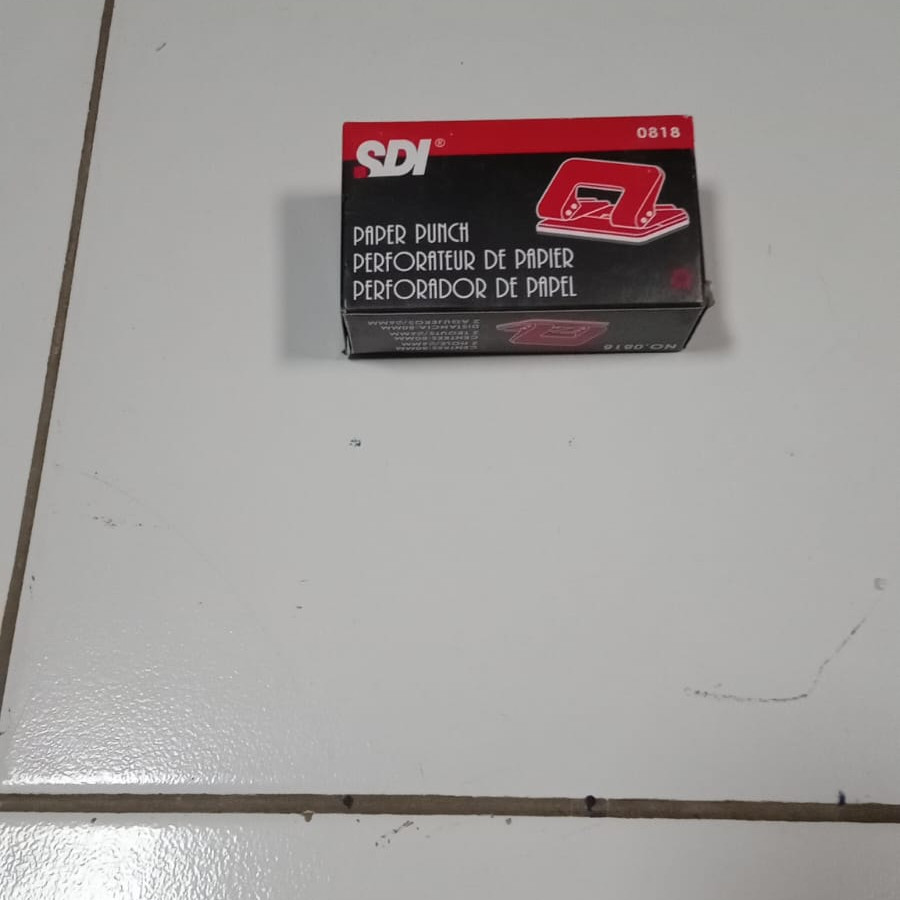pembolong kertas sdi