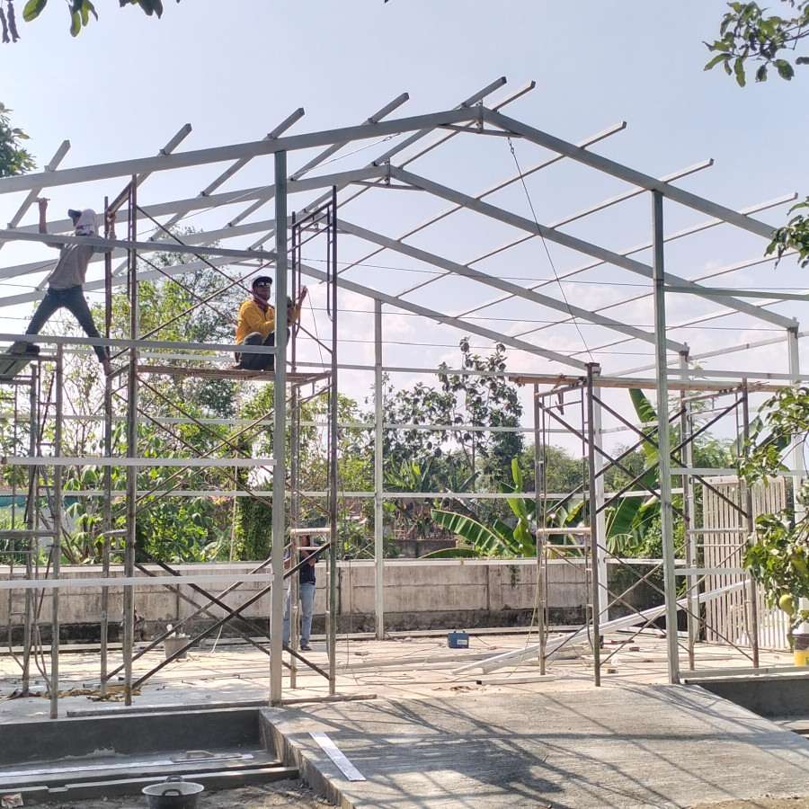 Pasang penutup dinding galvalum rangka besi hollow per m2 - depan