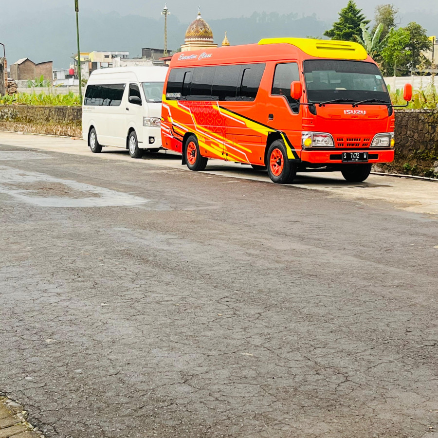 SEWA KENDARAAN ELF ISUZU ORANGE KUNING NOPOL S 7472 W