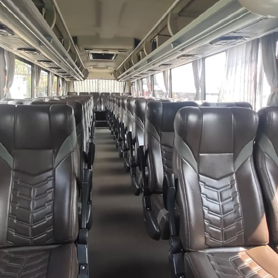 Sewa Bus Pariwisata Antar Kota dan Antar Provinsi - samping